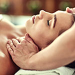 Therapist performing gentle lymphatic massage on client’s neck to promote detoxification and immune health at Spirit & Body Massage Prescott Valley