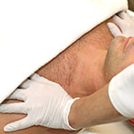 Therapist offering gentle oncology massage in a calm spa setting at Spirit & Body Massage Prescott Valley AZ.